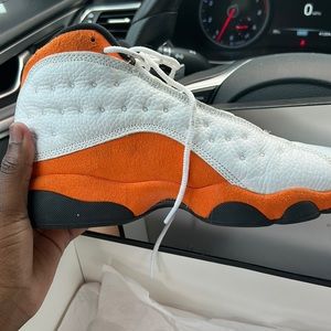 Orange and white retro Jordan’s size 6.5 and it comes with box